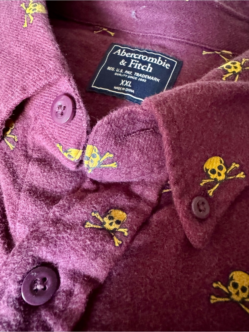 Abercrombie & Fitch Purple Knit Top with Yellow Skull Motif